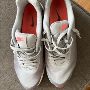 Nike Gray and Pink Sneakers with Lace-Up Design